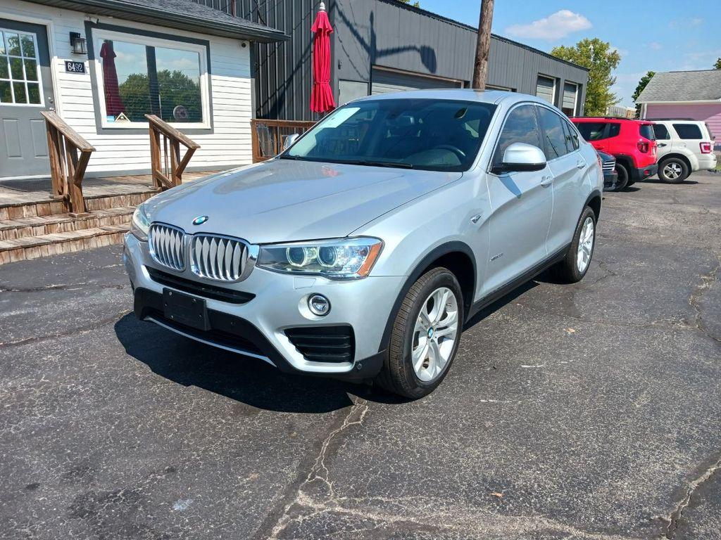 used 2016 BMW X4 car, priced at $14,305