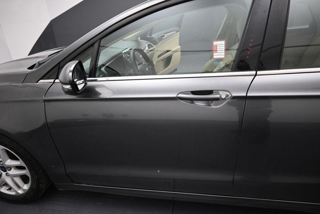 used 2016 Ford Fusion car, priced at $6,500