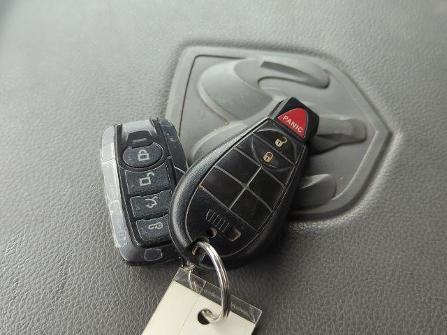 used 2015 Ram 1500 car, priced at $14,000