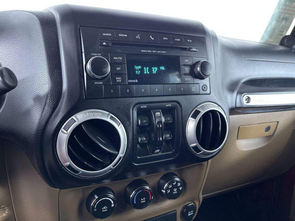 used 2012 Jeep Wrangler Unlimited car, priced at $14,700