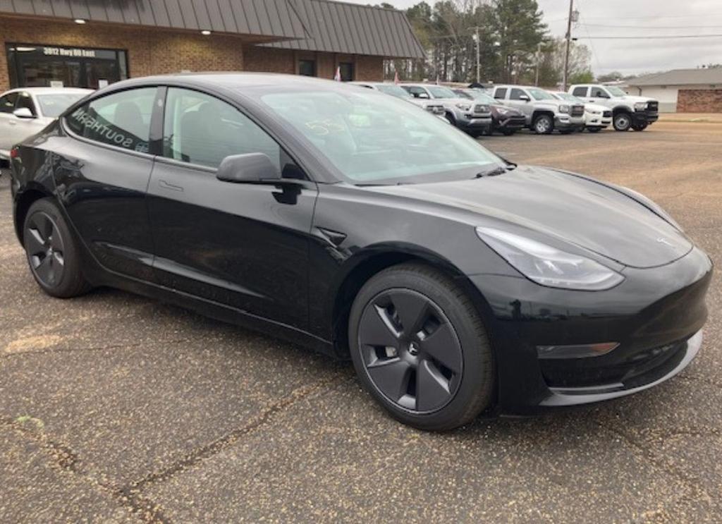 used 2023 Tesla Model 3 car, priced at $29,950