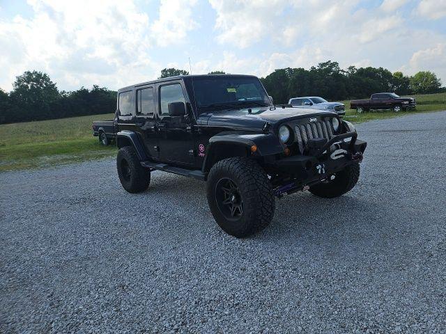 used 2013 Jeep Wrangler Unlimited car, priced at $13,289
