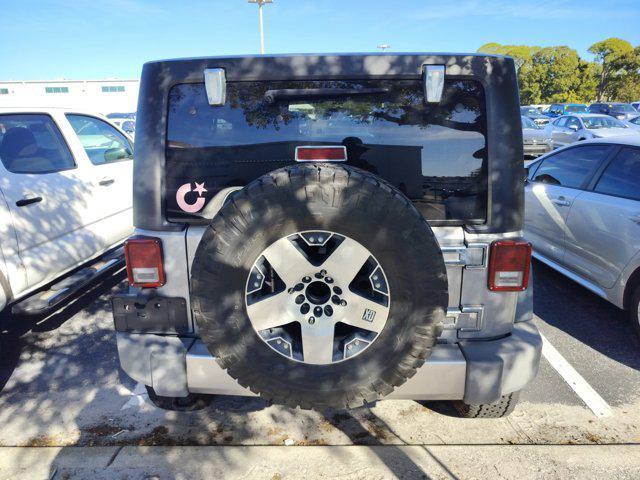 used 2016 Jeep Wrangler Unlimited car, priced at $13,596