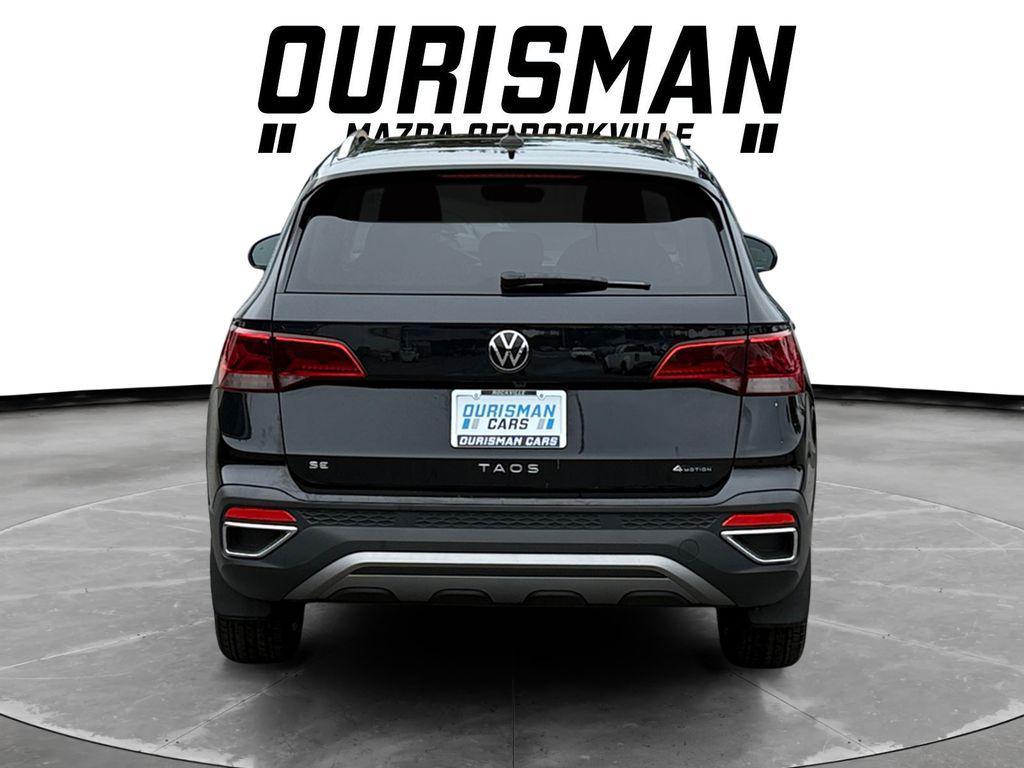 used 2024 Volkswagen Taos car, priced at $22,300