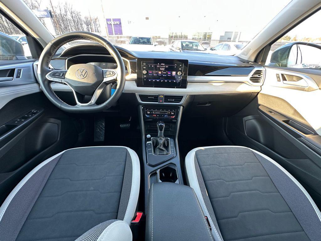 used 2025 Volkswagen Taos car, priced at $22,500