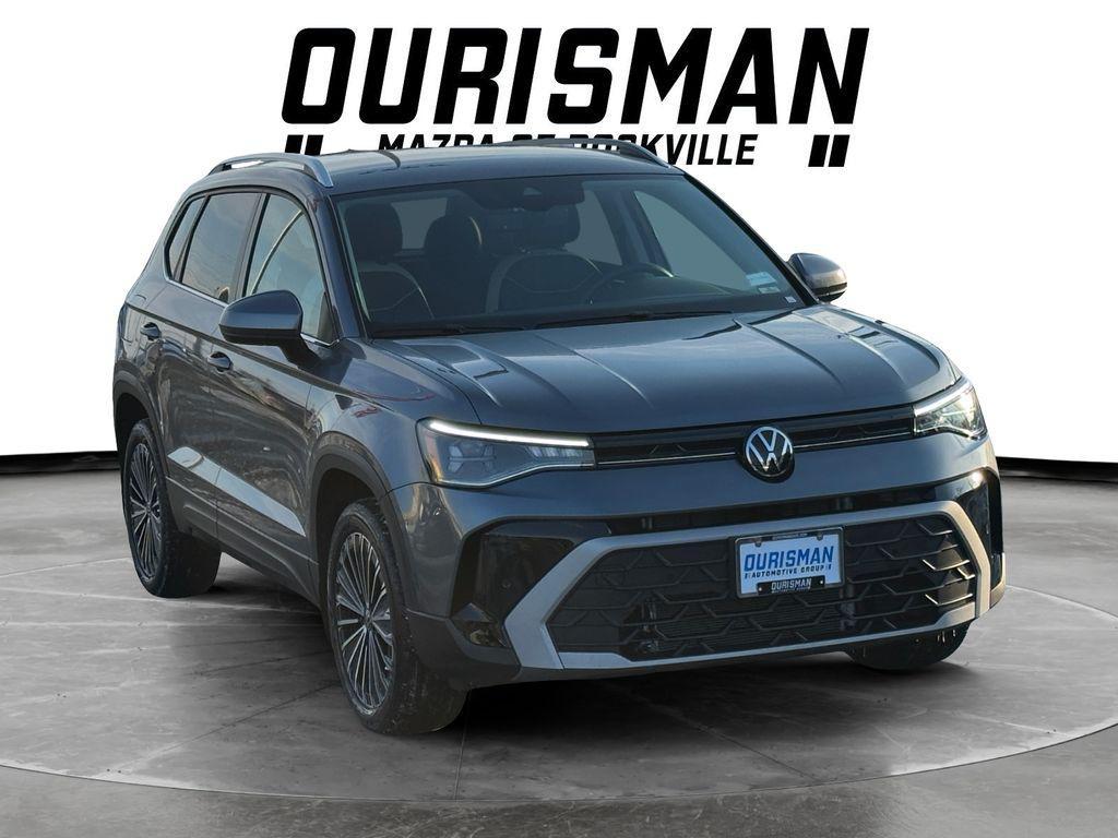used 2025 Volkswagen Taos car, priced at $22,500