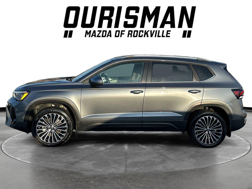 used 2025 Volkswagen Taos car, priced at $22,500