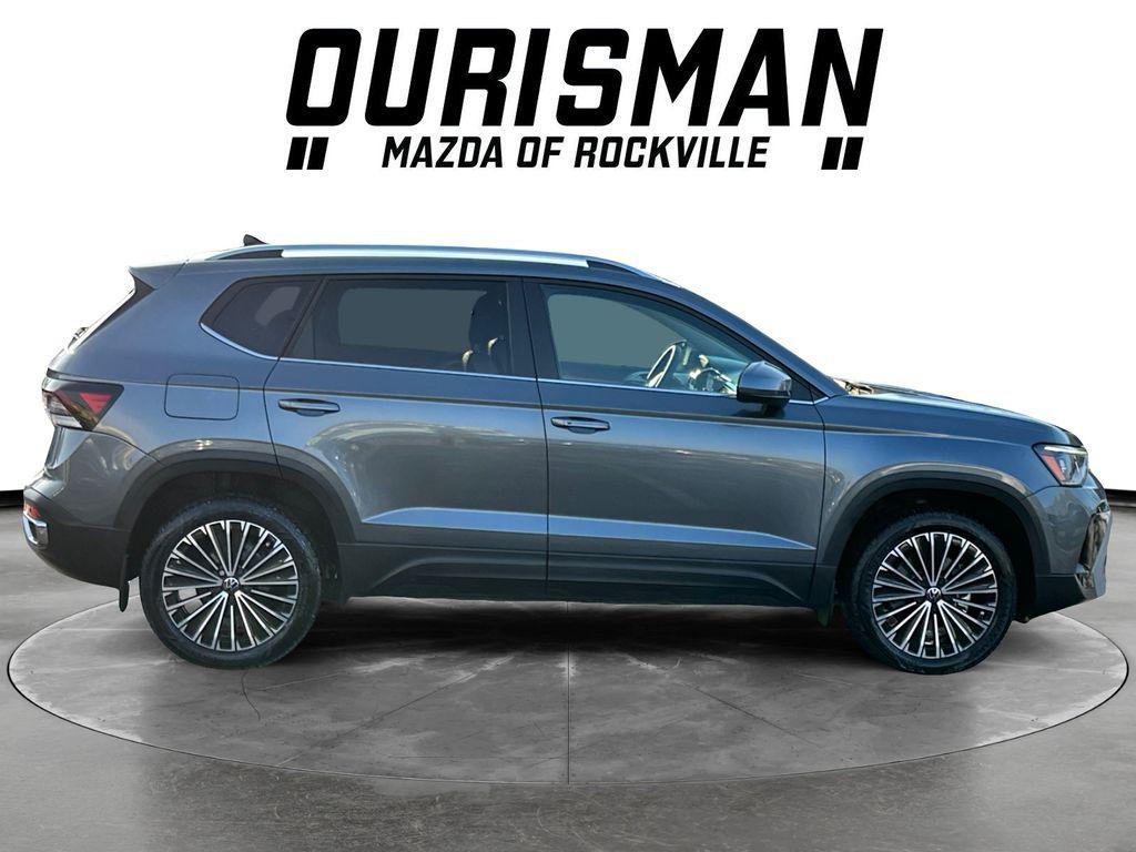 used 2025 Volkswagen Taos car, priced at $22,500
