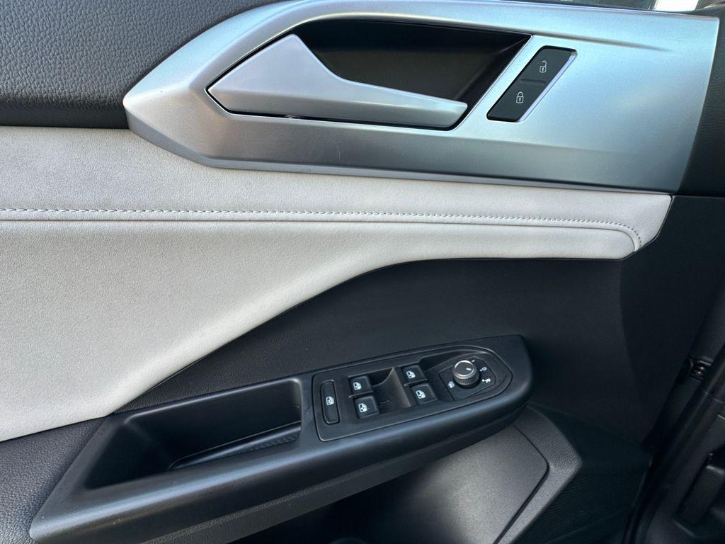 used 2025 Volkswagen Taos car, priced at $22,500