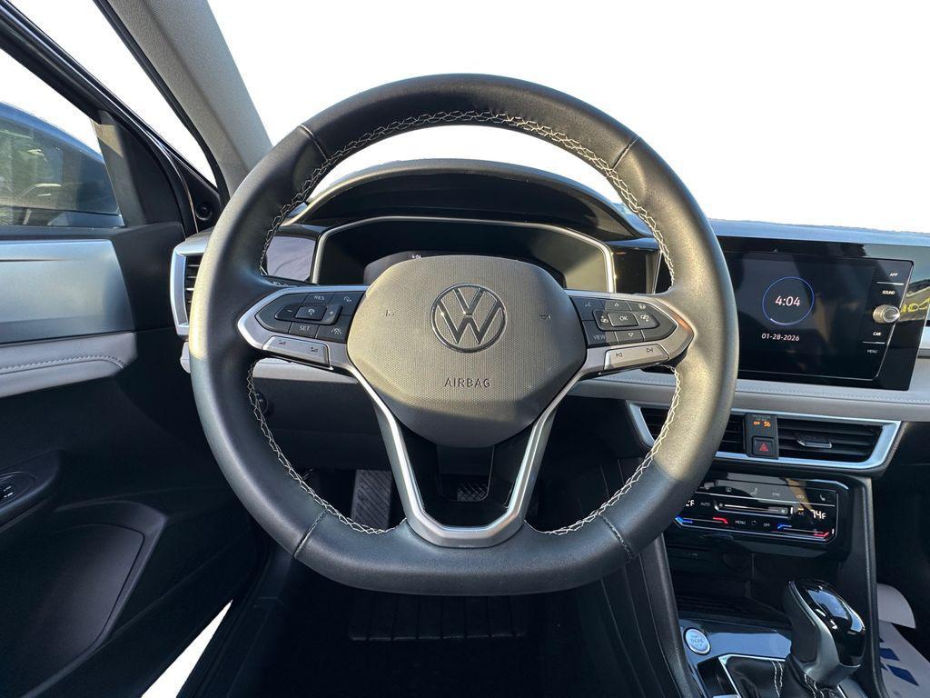 used 2025 Volkswagen Taos car, priced at $22,500
