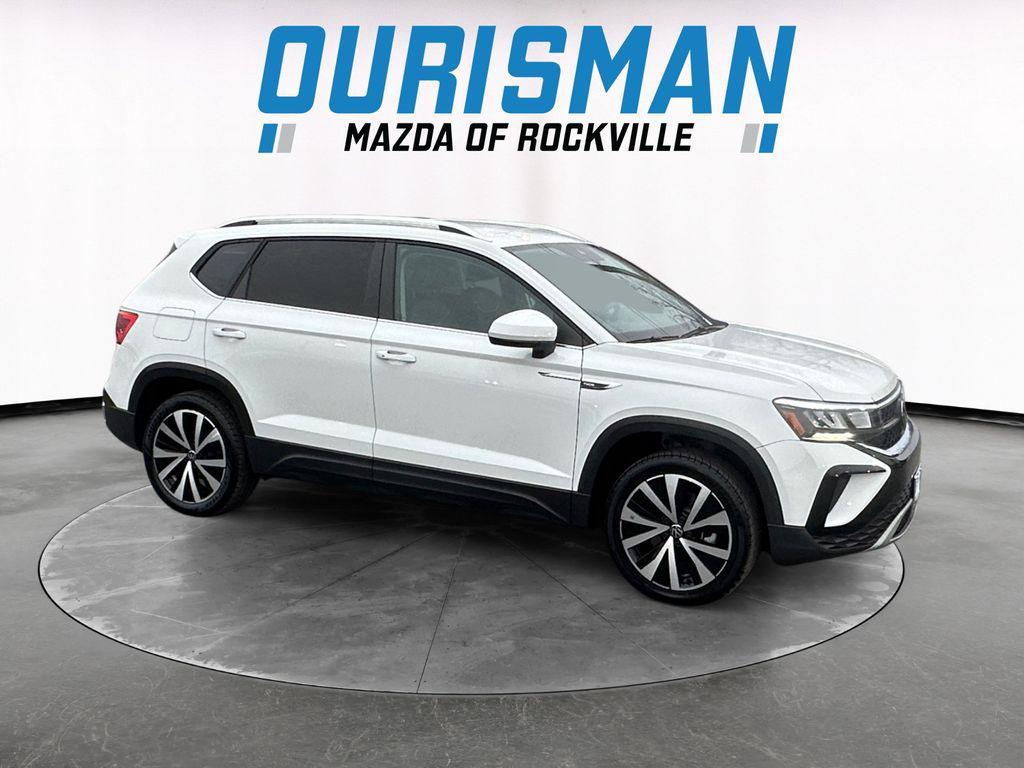 used 2023 Volkswagen Taos car, priced at $21,000