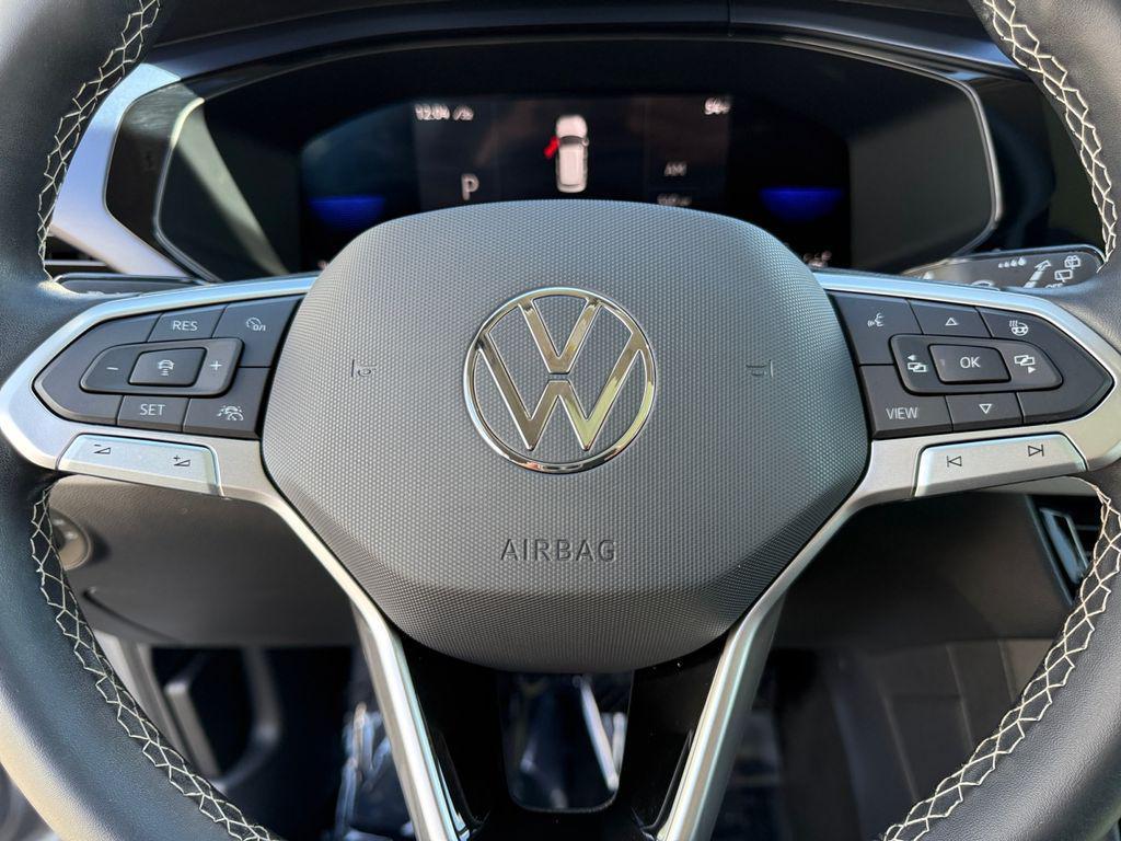 used 2023 Volkswagen Taos car, priced at $22,000