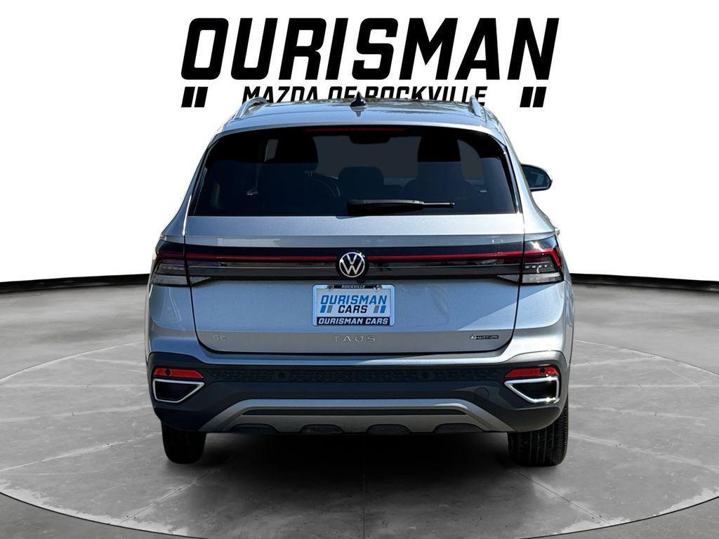 used 2025 Volkswagen Taos car, priced at $23,000