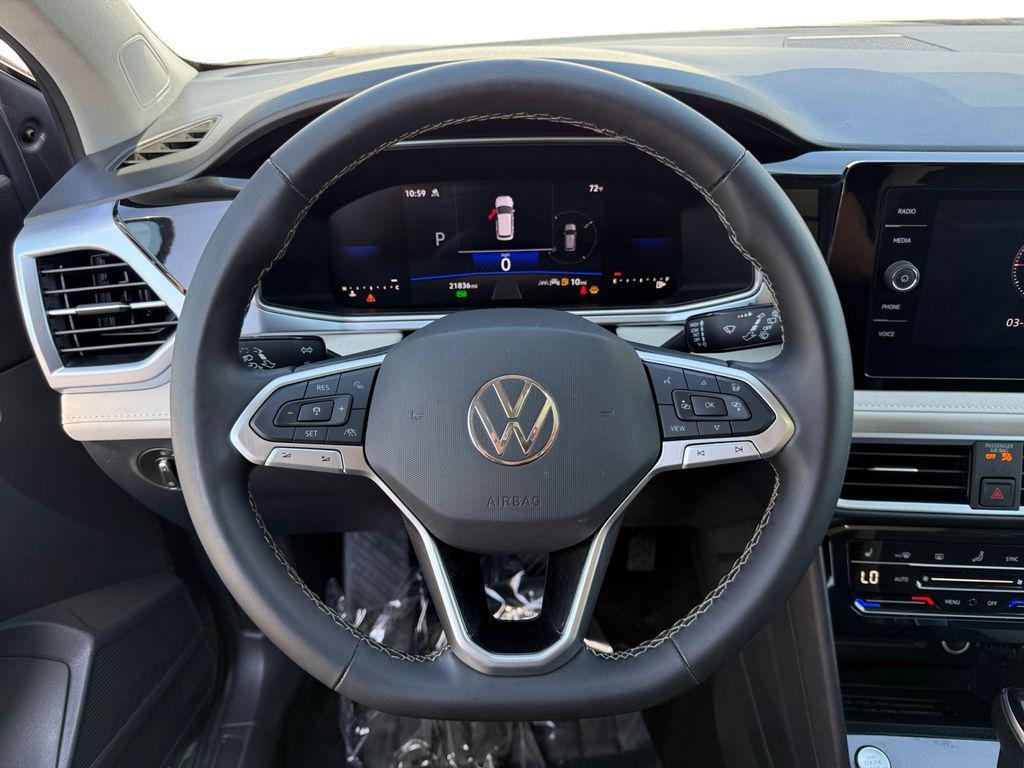 used 2025 Volkswagen Taos car, priced at $23,000