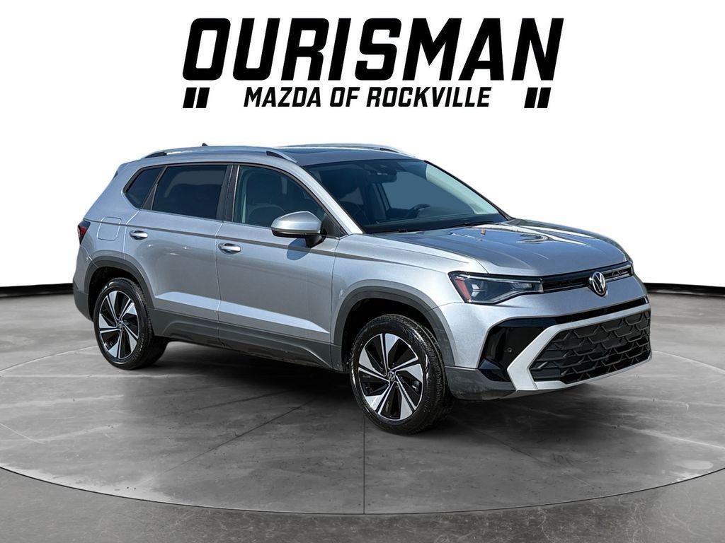 used 2025 Volkswagen Taos car, priced at $23,000
