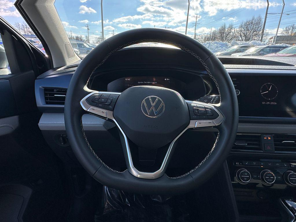 used 2024 Volkswagen Taos car, priced at $20,000