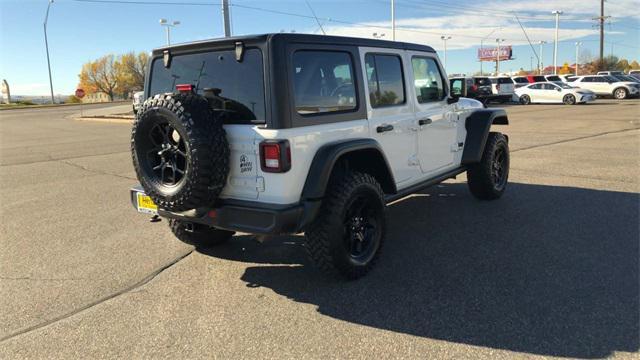 used 2024 Jeep Wrangler car, priced at $34,567