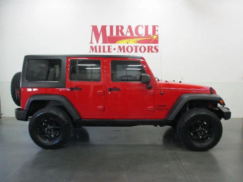 used 2014 Jeep Wrangler Unlimited car, priced at $12,950