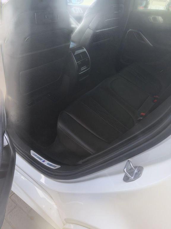 used 2023 BMW X6 car, priced at $56,905