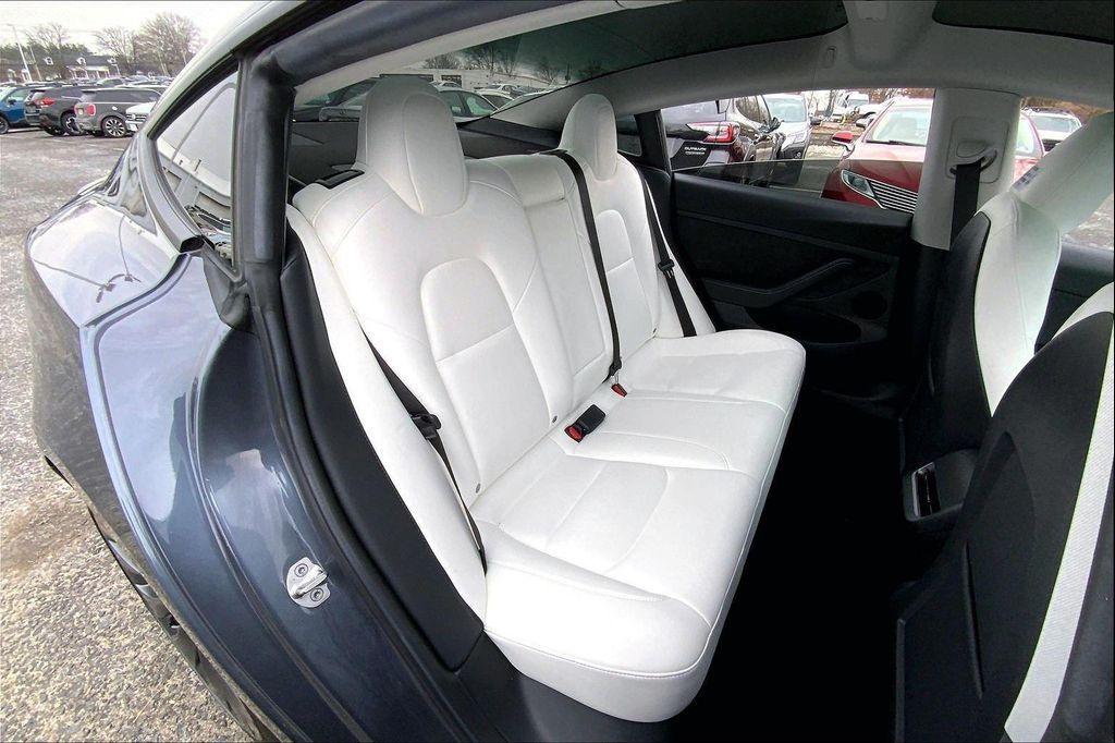 used 2023 Tesla Model 3 car, priced at $31,500