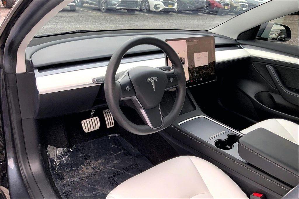 used 2023 Tesla Model 3 car, priced at $31,500