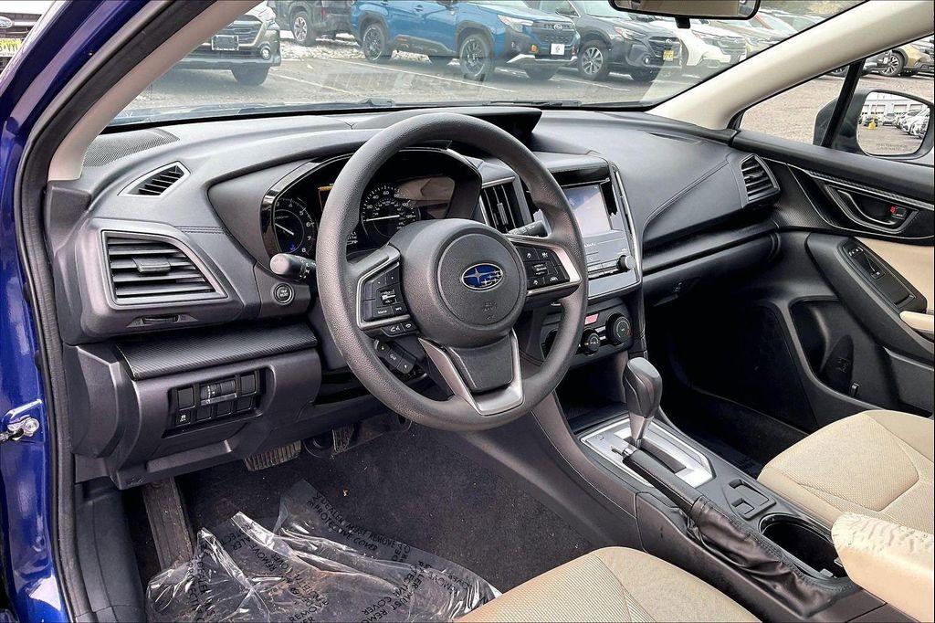 used 2023 Subaru Impreza car, priced at $16,990