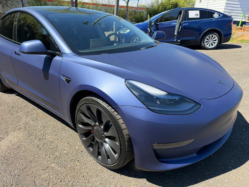 used 2022 Tesla Model 3 car, priced at $21,500