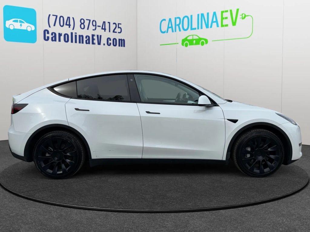 used 2023 Tesla Model Y car, priced at $25,900