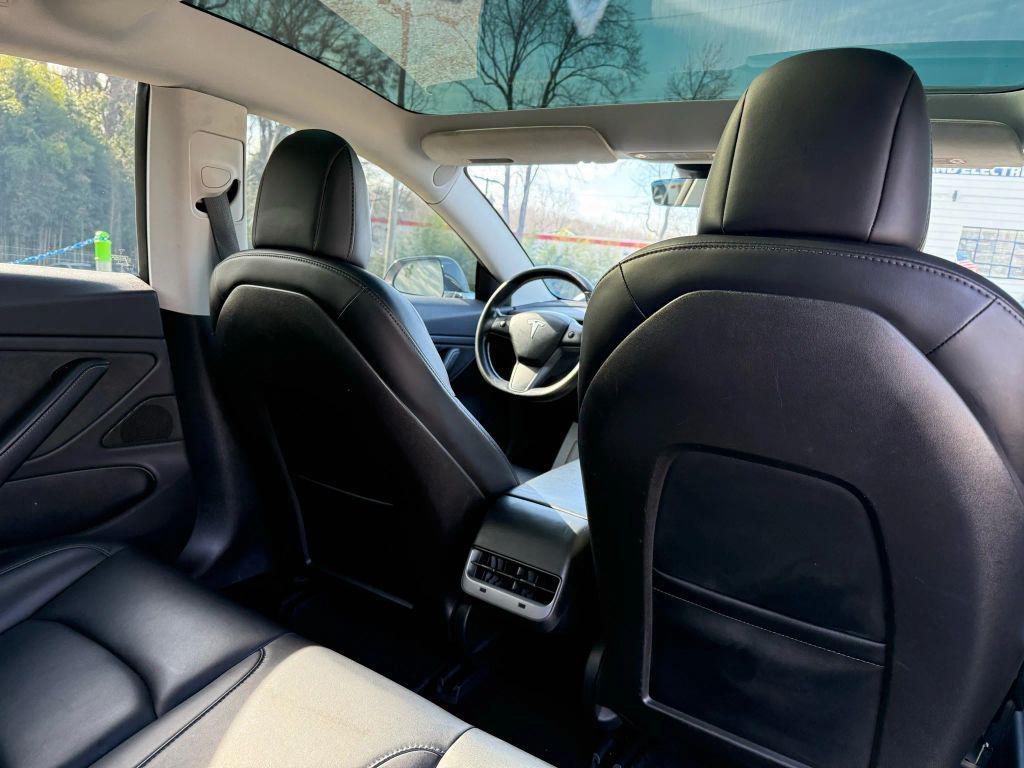 used 2018 Tesla Model 3 car, priced at $14,900