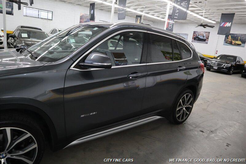 used 2018 BMW X1 car, priced at $12,800