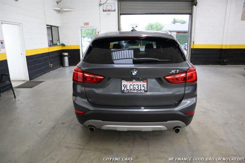 used 2018 BMW X1 car, priced at $12,800
