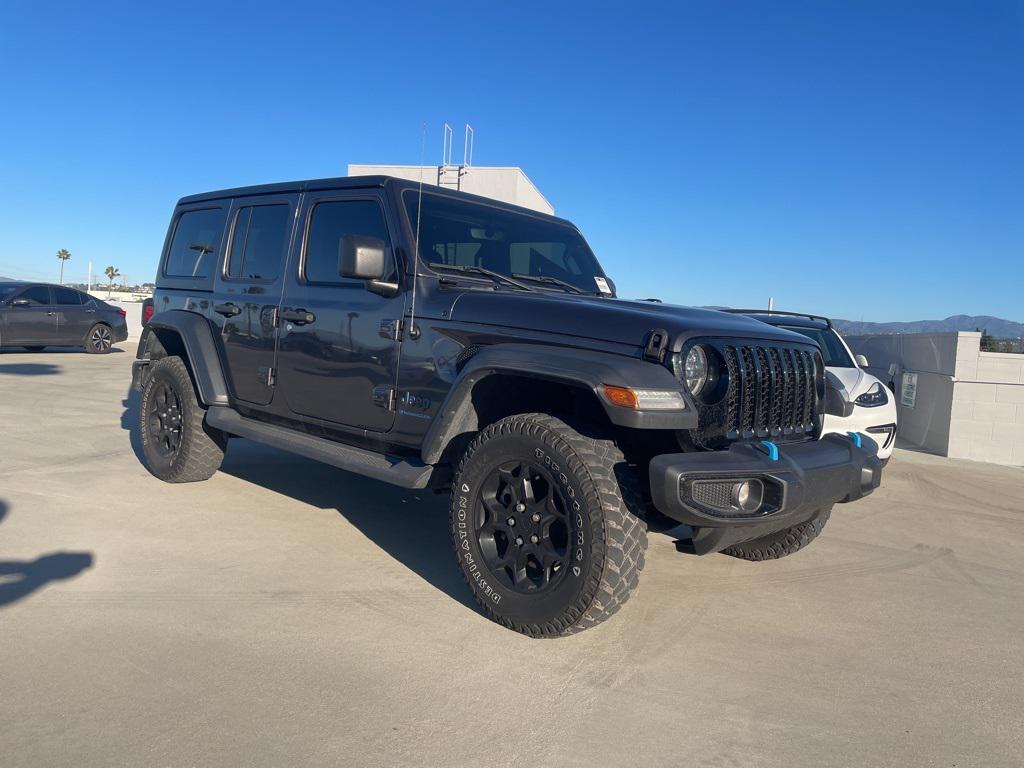 used 2023 Jeep Wrangler 4xe car, priced at $27,353