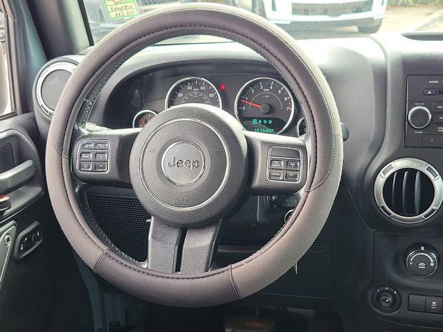 used 2015 Jeep Wrangler Unlimited car, priced at $15,950