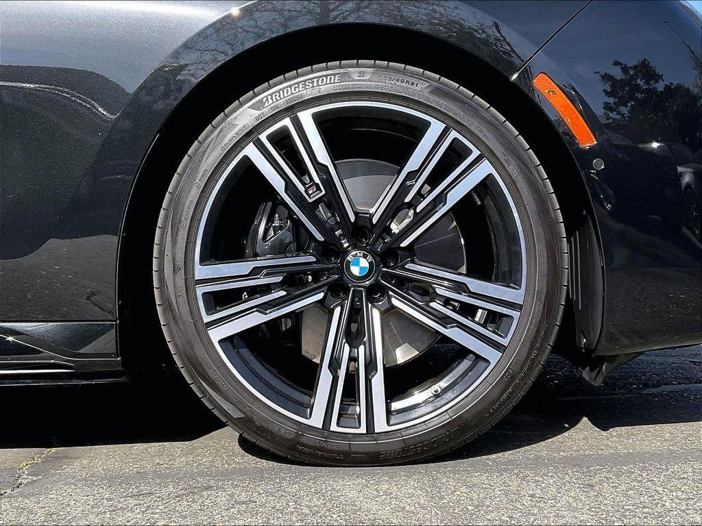 used 2025 BMW 750e car, priced at $96,499