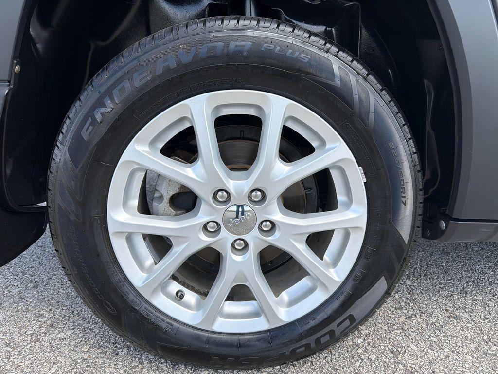 used 2014 Jeep Cherokee car, priced at $10,000