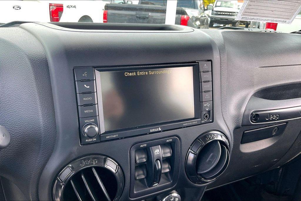 used 2017 Jeep Wrangler Unlimited car, priced at $24,689
