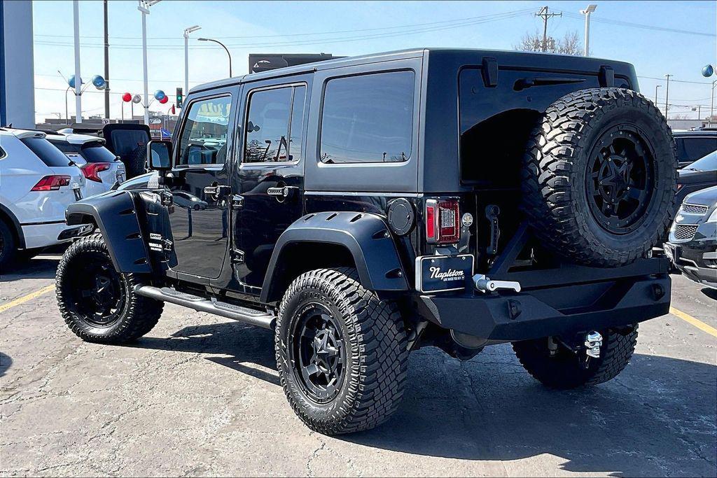 used 2011 Jeep Wrangler Unlimited car, priced at $11,765