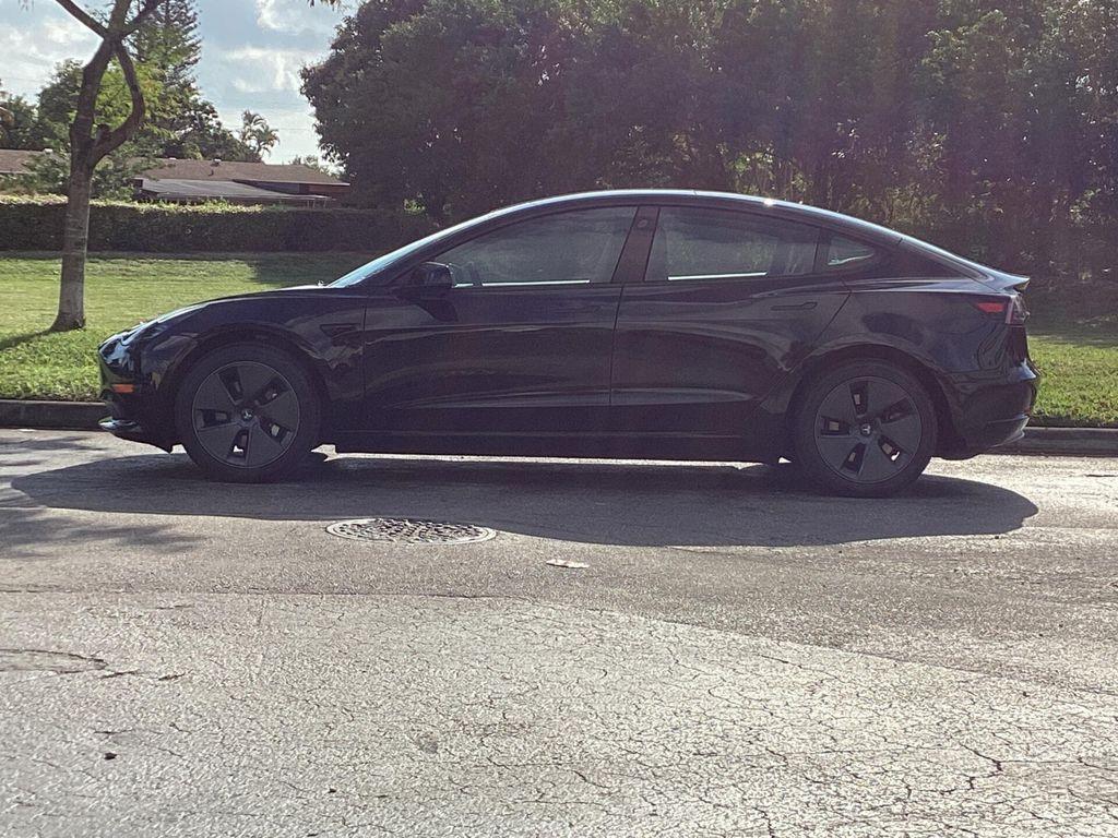 used 2023 Tesla Model 3 car, priced at $23,299