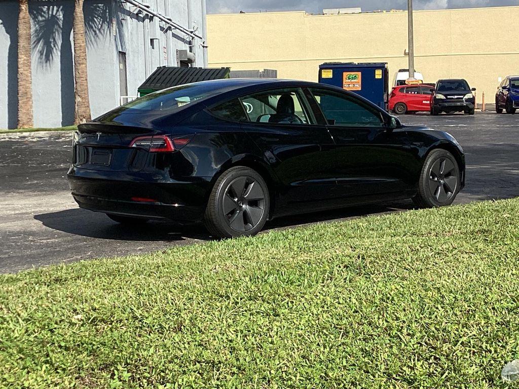 used 2023 Tesla Model 3 car, priced at $23,299