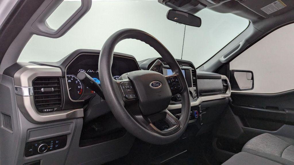 used 2021 Ford F-150 car, priced at $16,299