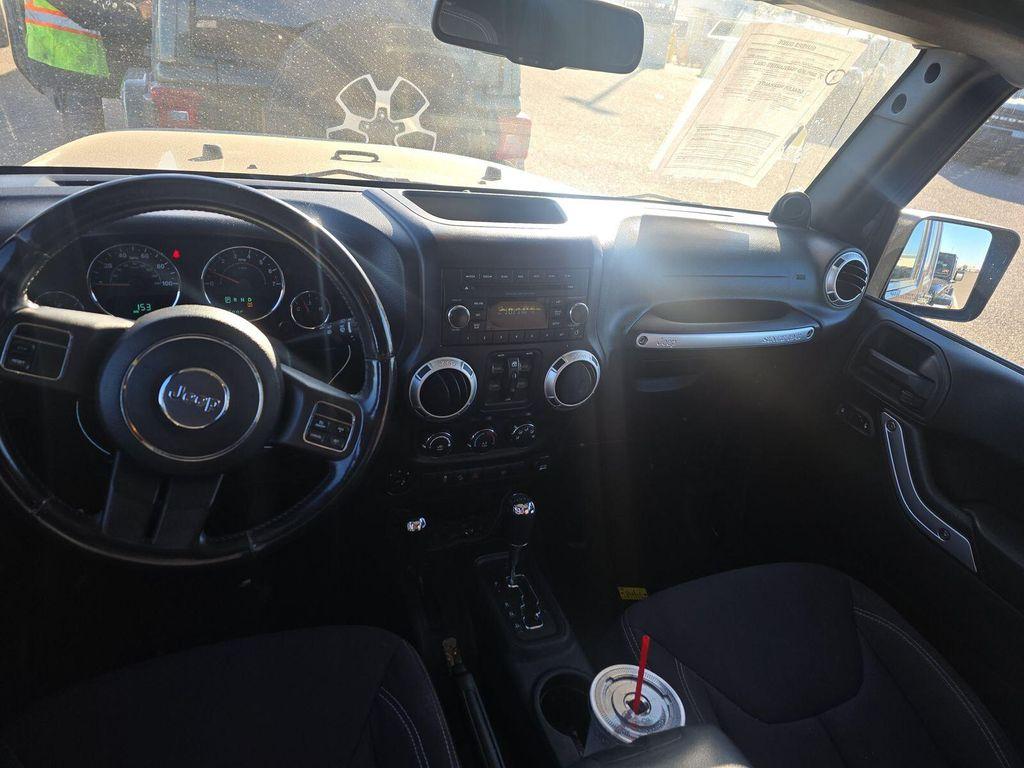 used 2013 Jeep Wrangler Unlimited car, priced at $12,899