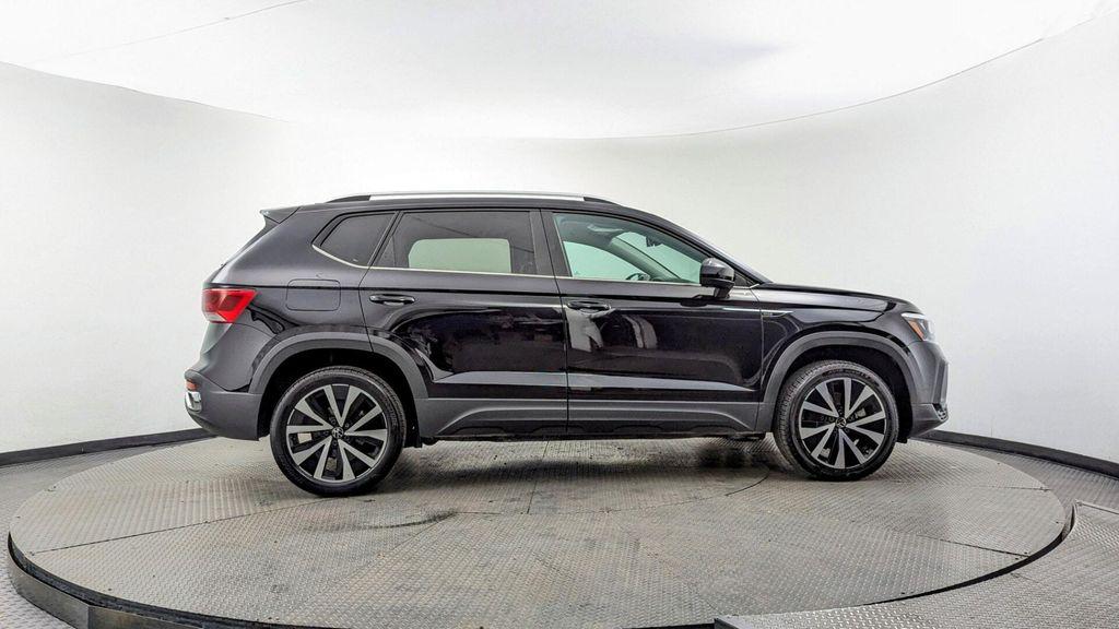 used 2024 Volkswagen Taos car, priced at $16,399