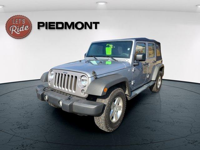 used 2014 Jeep Wrangler Unlimited car, priced at $16,450