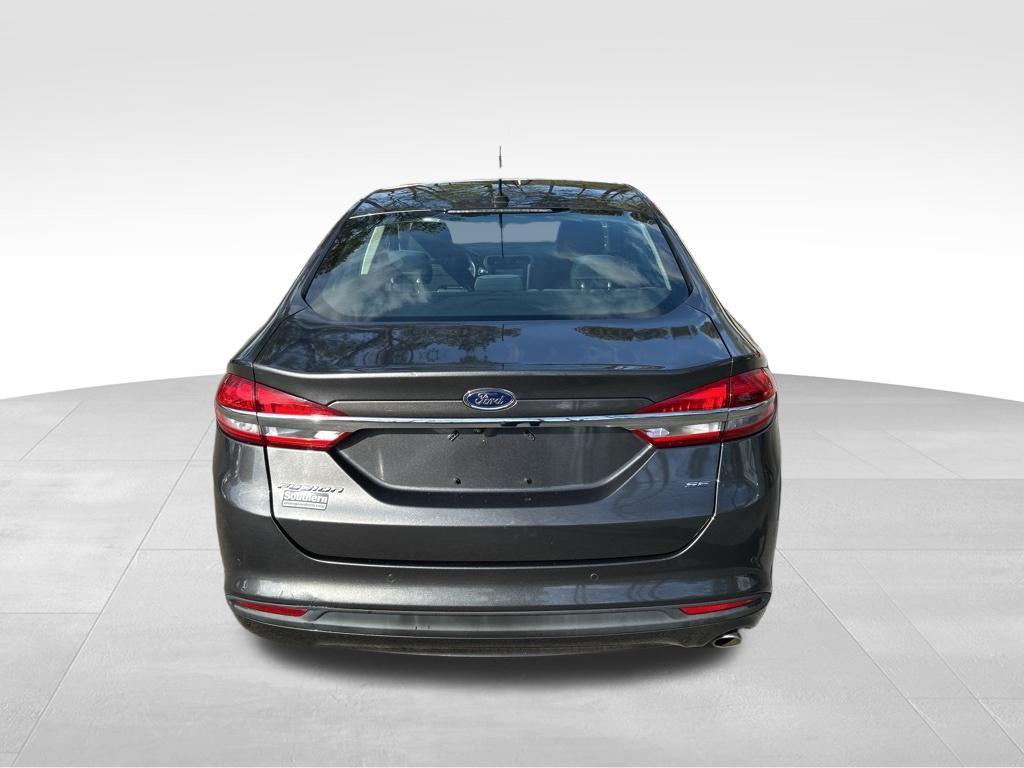 used 2018 Ford Fusion car, priced at $12,076