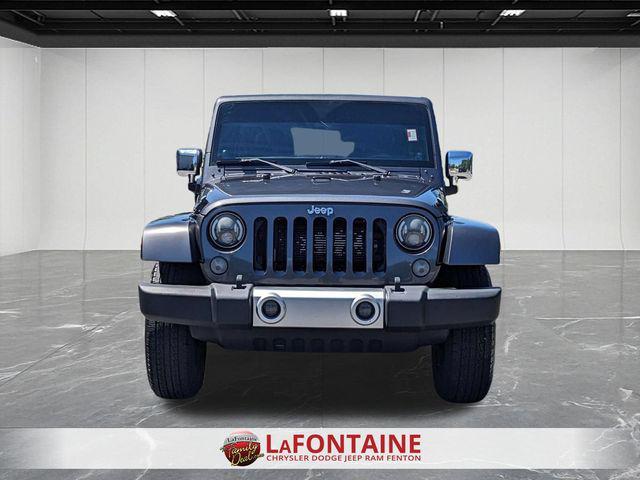 used 2014 Jeep Wrangler Unlimited car, priced at $14,168