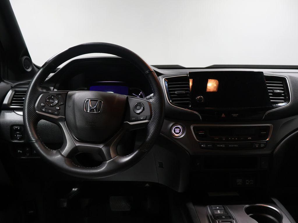 used 2023 Honda Passport car, priced at $31,200