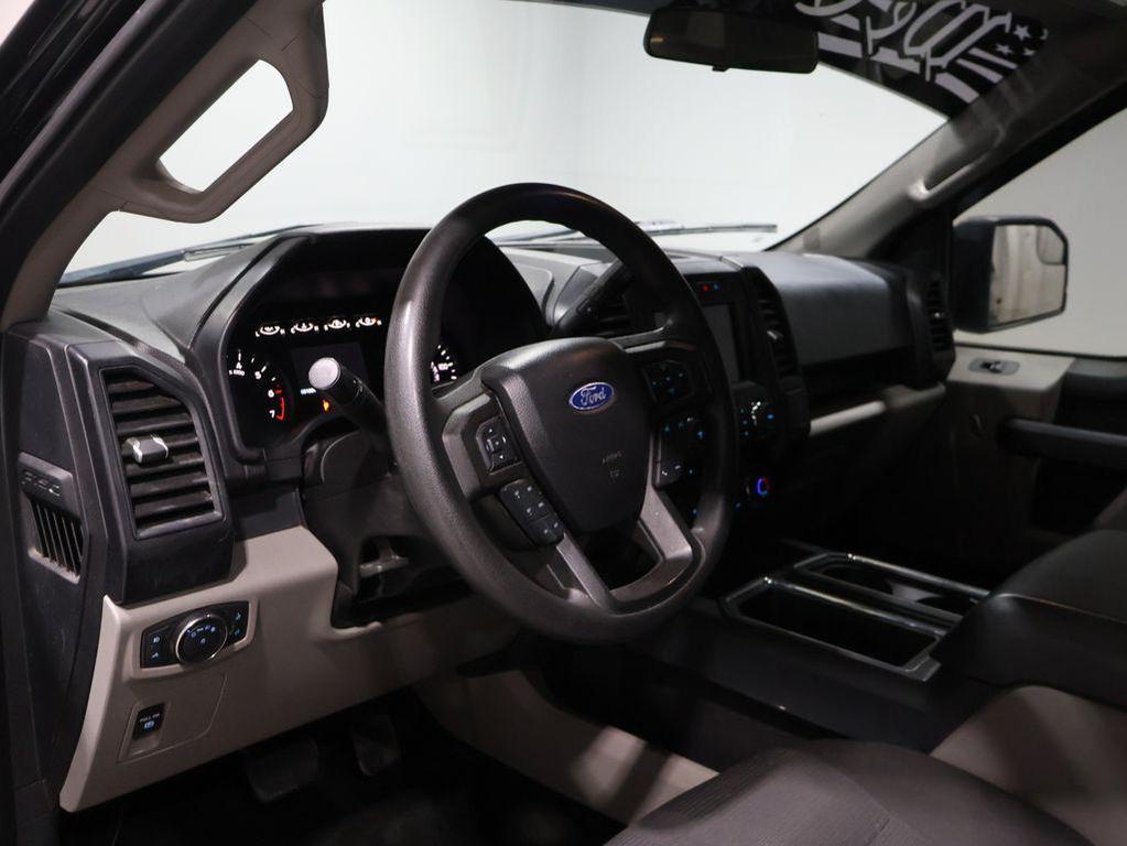 used 2018 Ford F-150 car, priced at $23,600