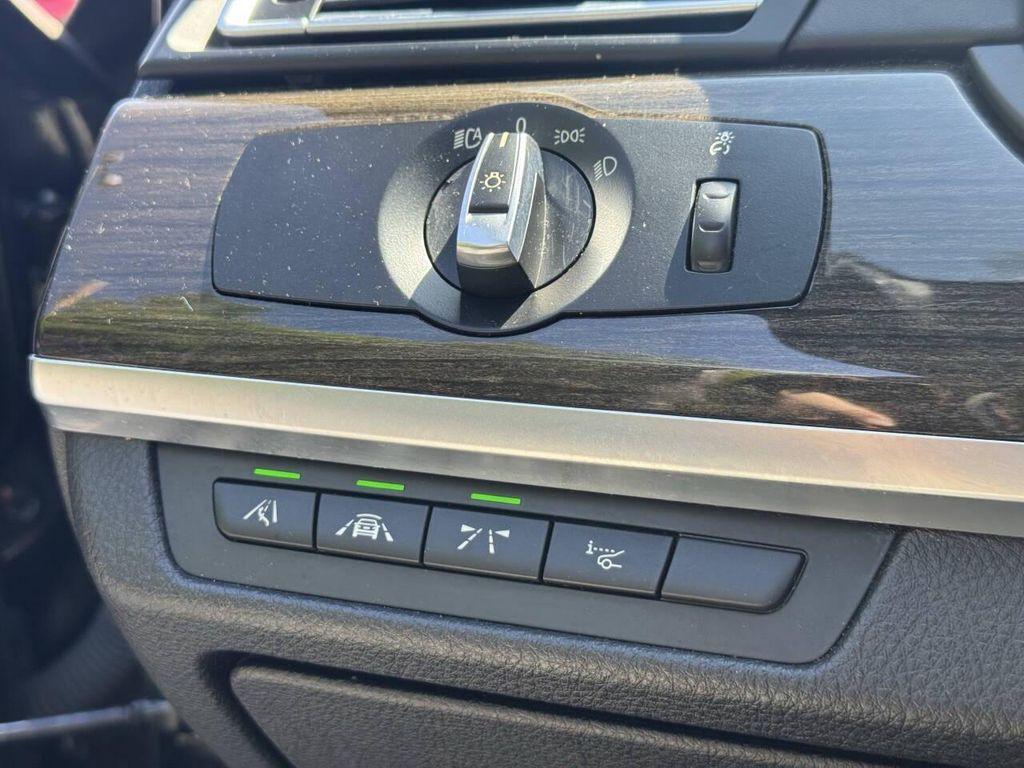 used 2015 BMW 750 car, priced at $9,995