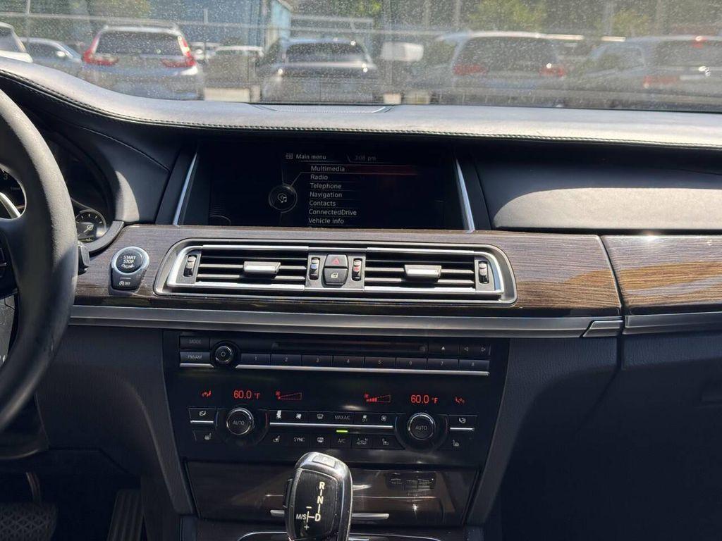 used 2015 BMW 750 car, priced at $9,995