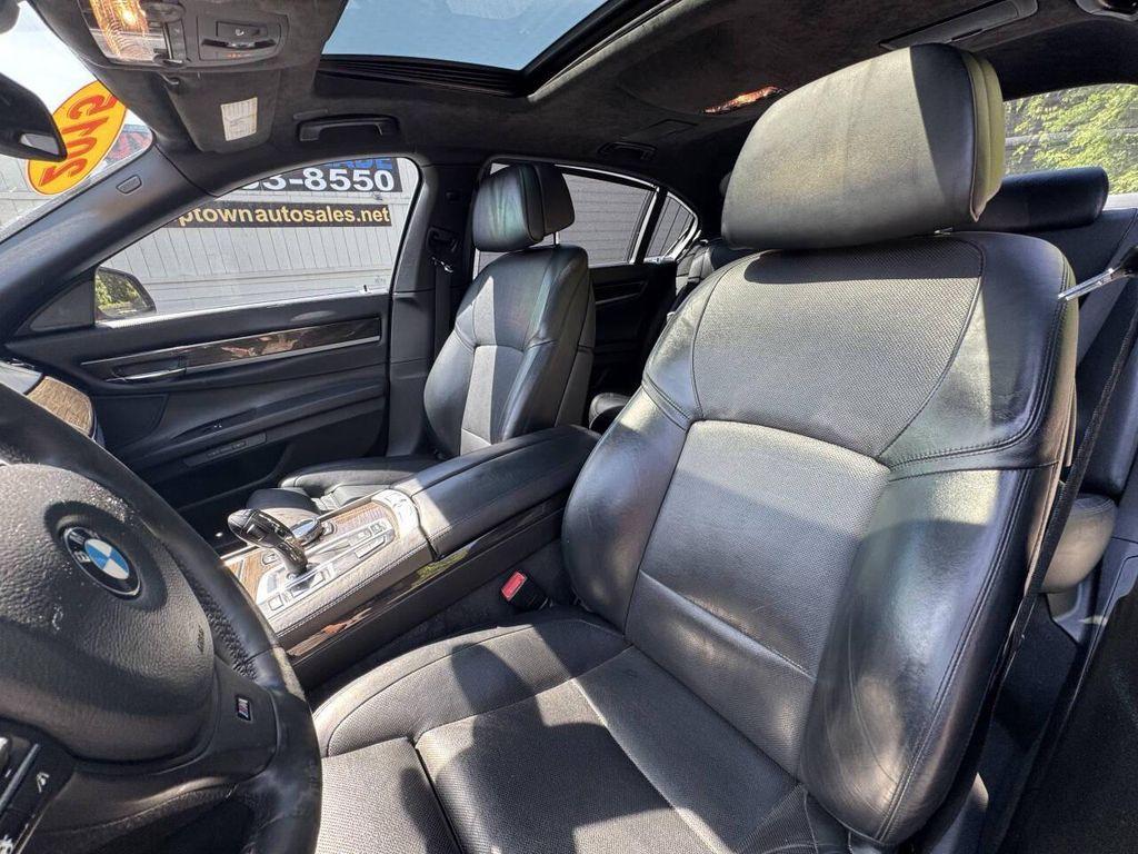 used 2015 BMW 750 car, priced at $9,995